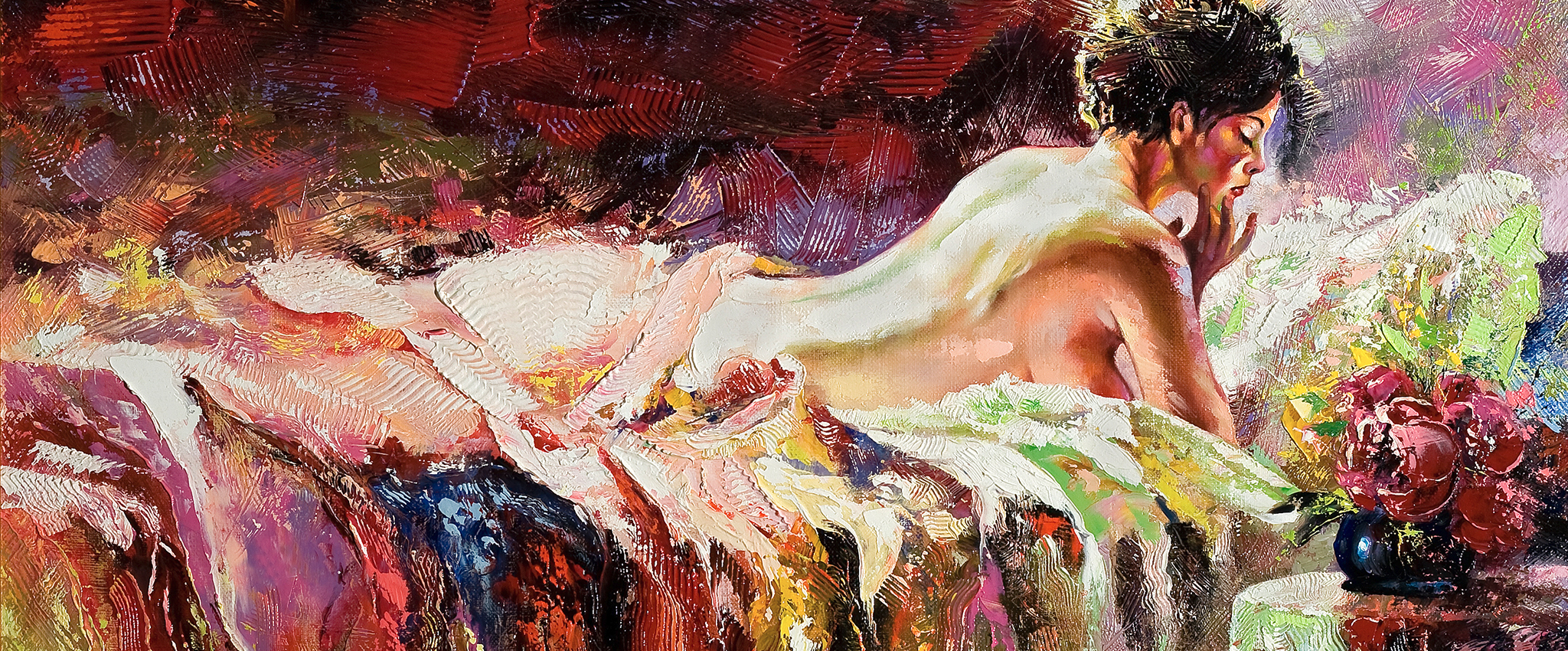 A painting of a naked woman with short curly black hair lying on a bed, half covered by colorful blankets. A vase of flowers sits on a round table beside the bed.