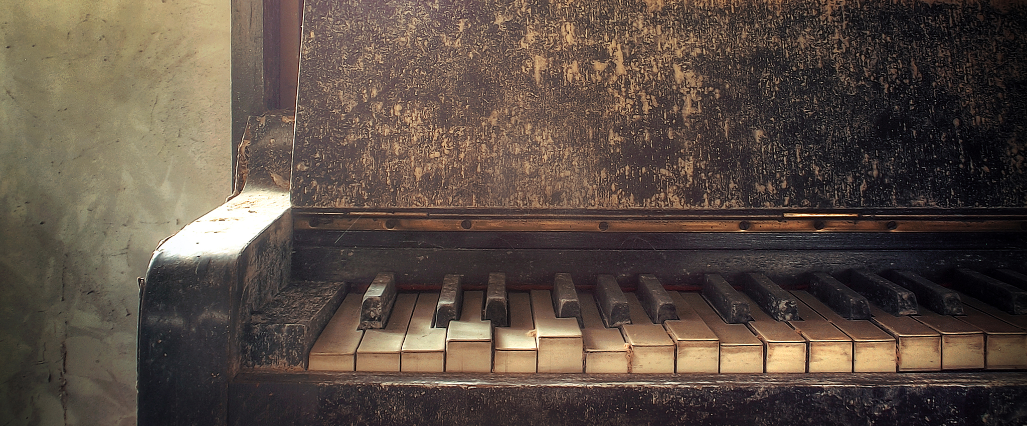 Out of tune and out of time. An old, broken-down piano with well-worn keys was found abandoned in a derelict Irish farmhouse.