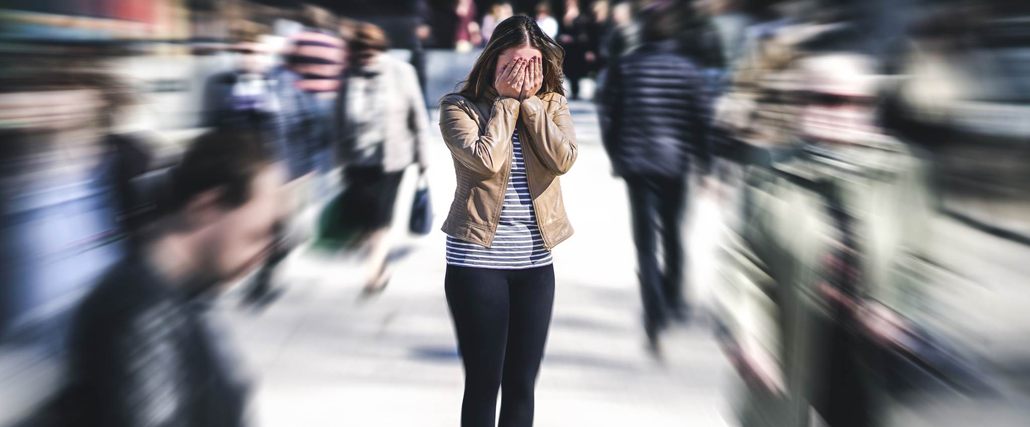 Panic attack in public place. Woman having panic disorder in cit