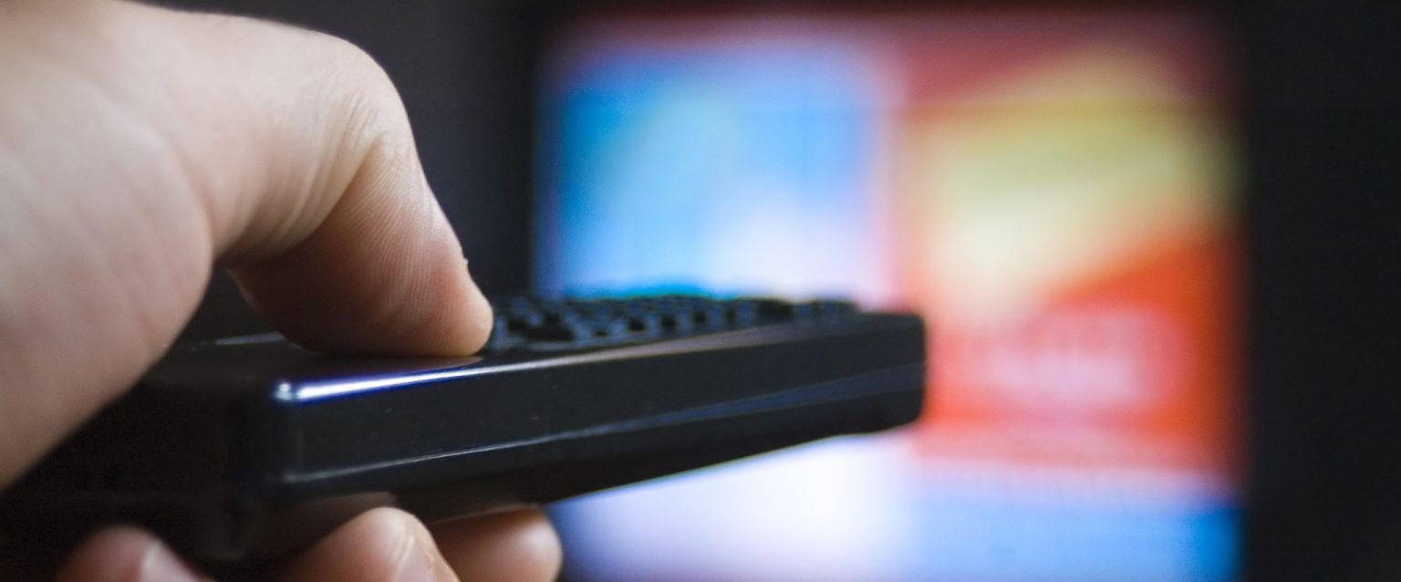 TV remote control. Searching through the channels.